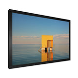 Designart "Coastal Minimalism Yellow Building In The Water I" Beach Framed Canvas Prints