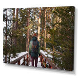 Designart "Hiking In Winter Forest" Forest Wall Art