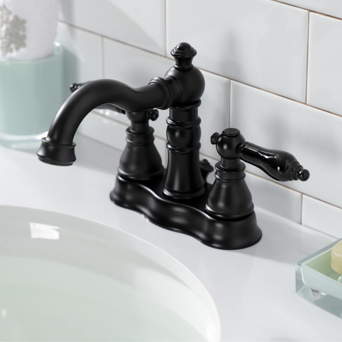 Kingston Brass Duchess Two-Handle 3-Hole Deck Mount 4" Centerset Bathroom Faucet with Brass Pop-Up