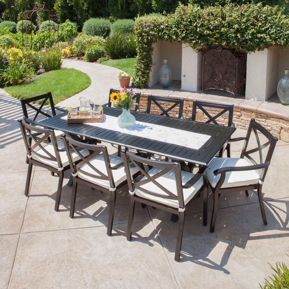 Exuma Outdoor Black Cast Aluminum Dining Set with Ivory Water Resistant Cushions by Christopher Knight Home