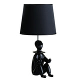 Fabric Shade Table Lamp with Polyresin Sitting Clown Base, Black