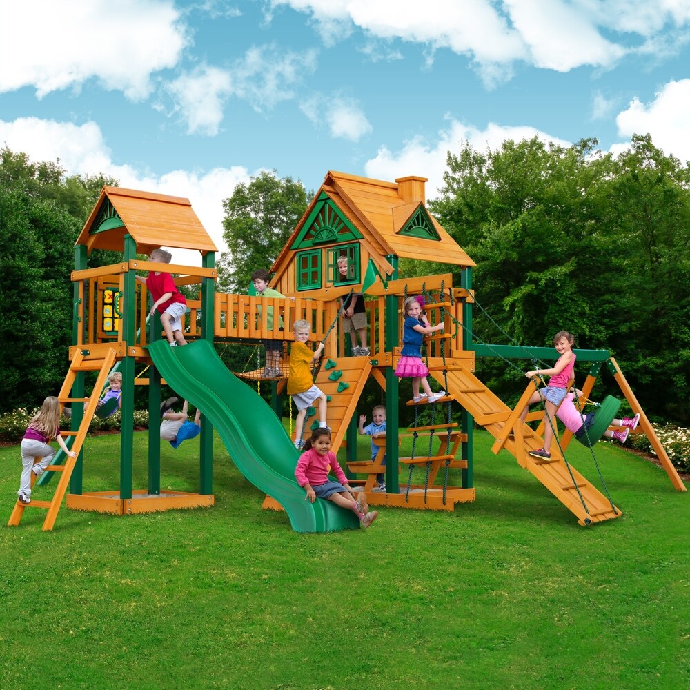 Gorilla Playsets Pioneer Peak Treehouse Cedar Swing Set with Fort Add-On and Timber Shield Posts