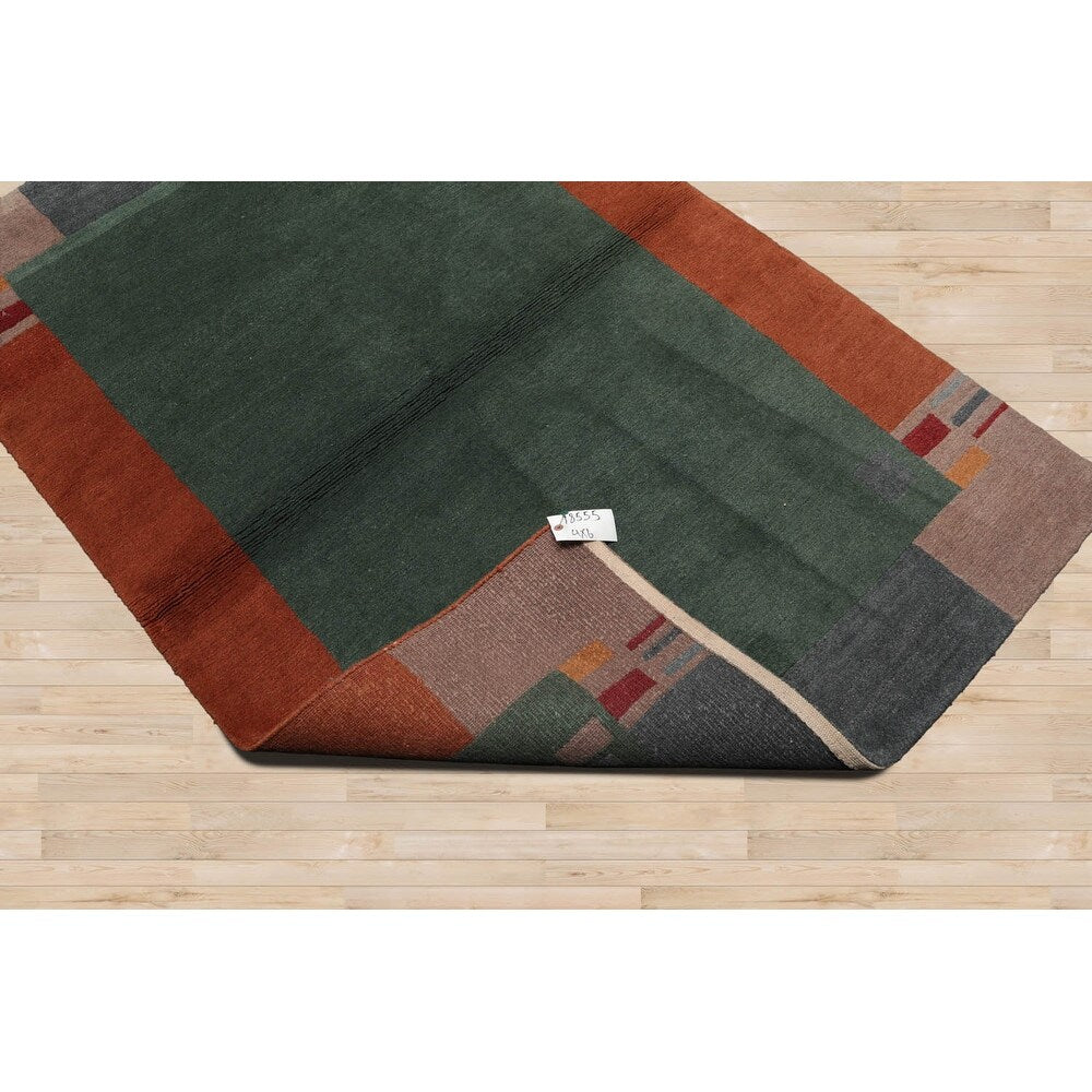 Hand Knotted Tibetan Green Bordered Wool Modern Oriental Area Rug - 4' x 6'