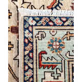 Hand Knotted Traditional Tribal Wool Ivory Area Rug - 4' 1" x 5' 10"