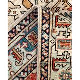 Hand Knotted Traditional Tribal Wool Ivory Area Rug - 4' 1" x 5' 10"