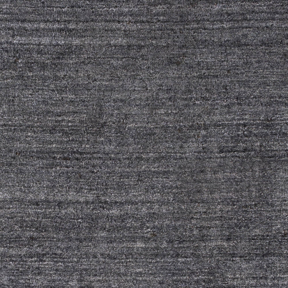 Hand-woven Dan Solid Viscose Area Rug