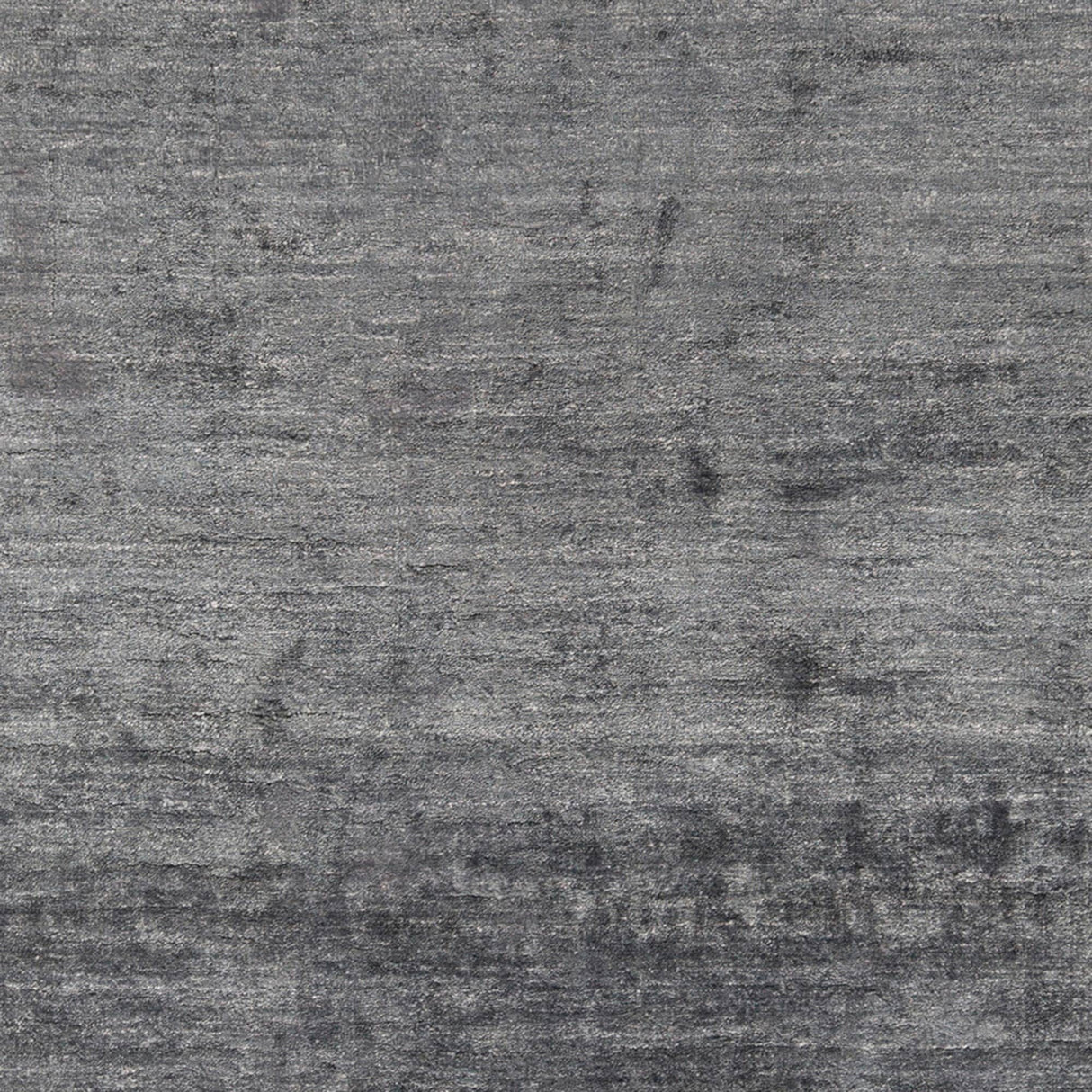 Hand-woven Dan Solid Viscose Area Rug