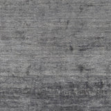 Hand-woven Dan Solid Viscose Area Rug