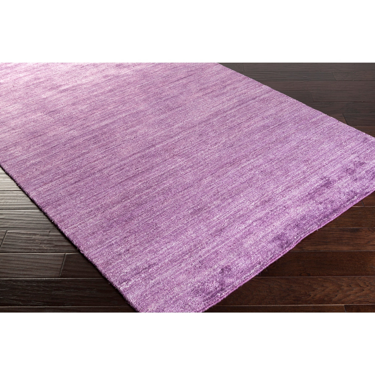 Hand-woven Dan Solid Viscose Area Rug