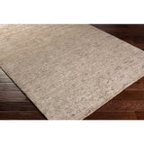 Hand-woven Dan Solid Viscose Area Rug