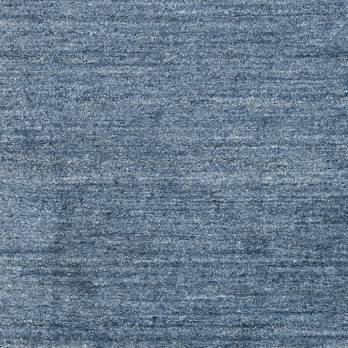 Hand-woven Dan Solid Viscose Area Rug