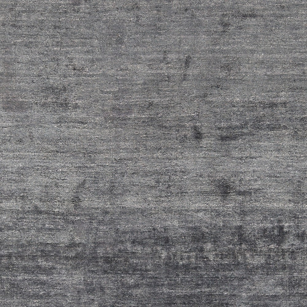 Hand-woven Dan Solid Viscose Area Rug