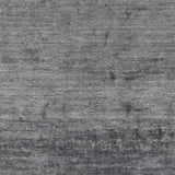 Hand-woven Dan Solid Viscose Area Rug