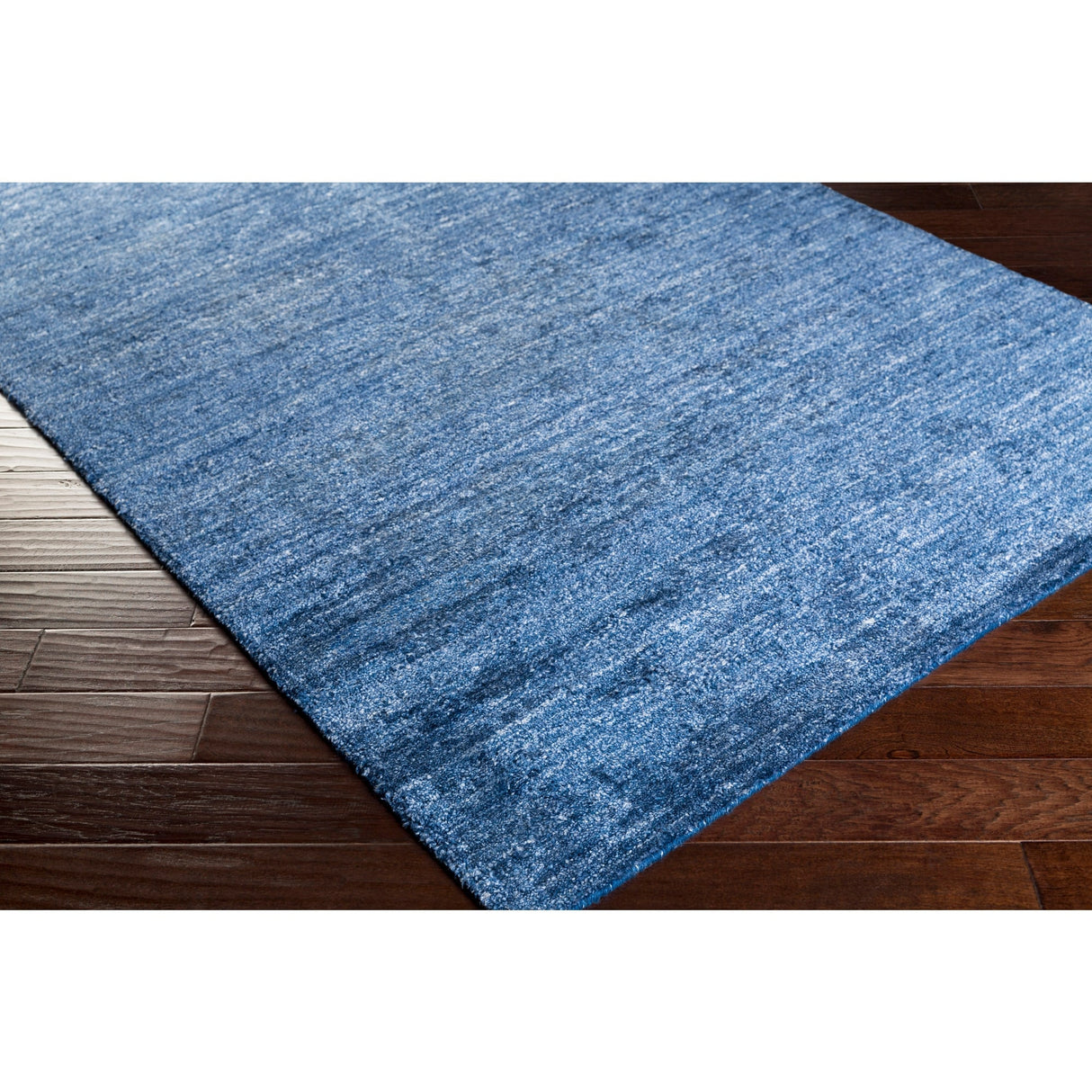 Hand-woven Dan Solid Viscose Area Rug