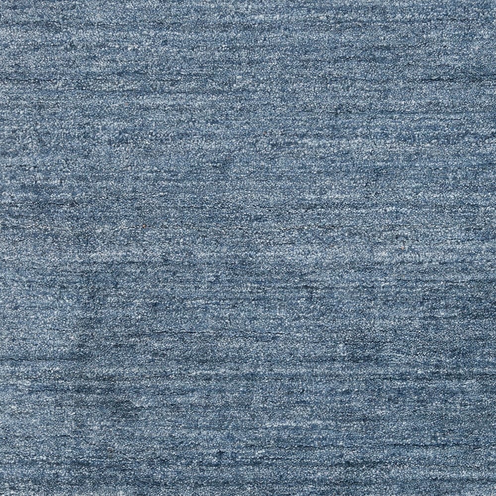 Hand-woven Dan Solid Viscose Area Rug