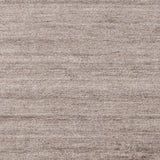 Hand-woven Dan Solid Viscose Area Rug