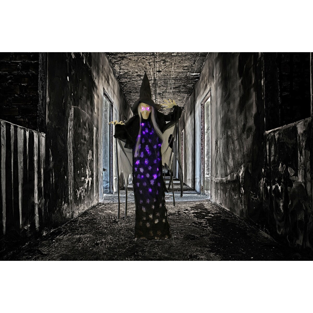 2.5-ft. Hanging Witch, Indoor/Covered Outdoor Halloween Decoration, LED Purple Eyes, Poseable, Autumn