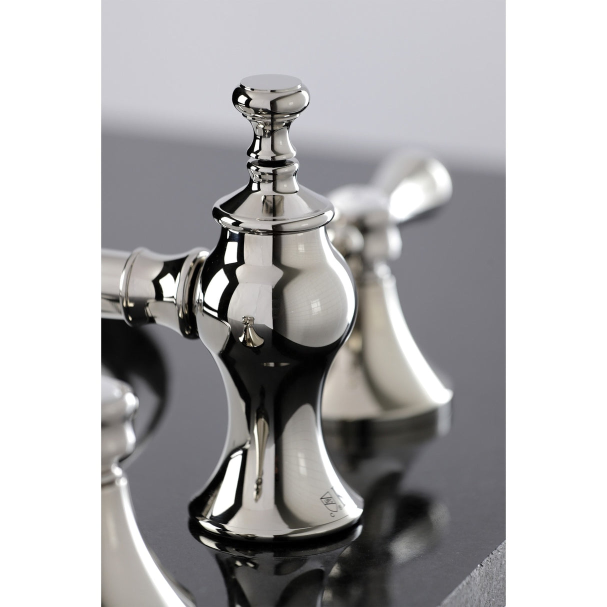 Kingston Brass Heirloom Deck Mount Widespread Bathroom Faucet with Brass Pop-Up