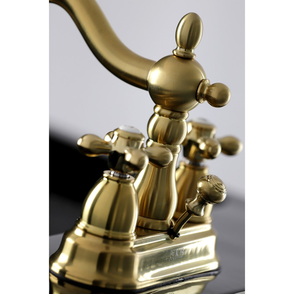 Kingston Brass Heritage Two-Handle 3-Hole Deck Mount 4 in. Centerset Bathroom Faucet