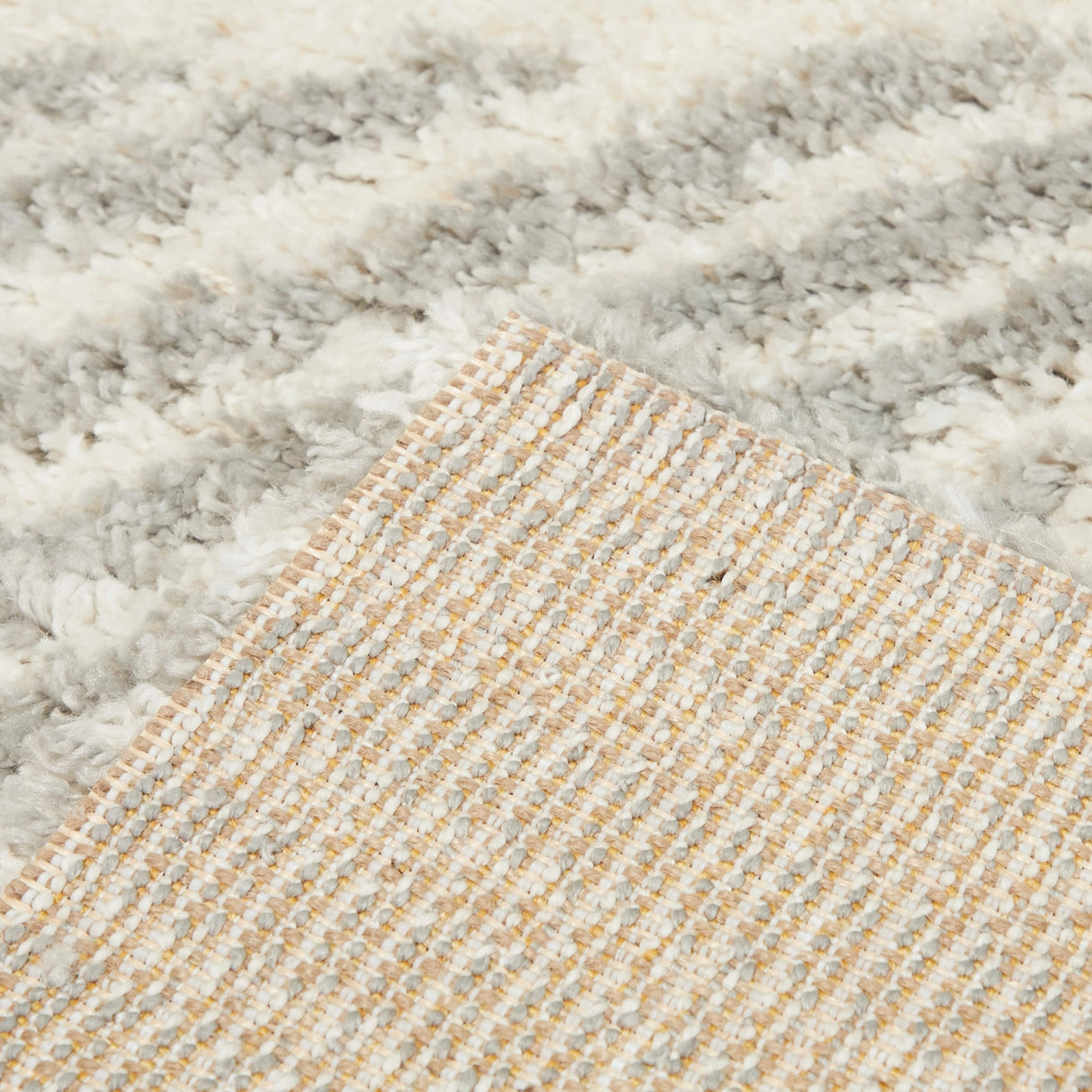 Hughes Geometric Striped Shag Area Rug