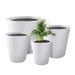 Kante 20.9", 17.7", 15" and 12.6"H Cylindrical Lightweight Concrete Modern Planters (Set of 4)