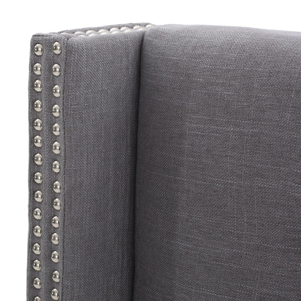 Kendrah Adjustable King/ California King Wing Back Studded Fabric Headboard by Christopher Knight Home