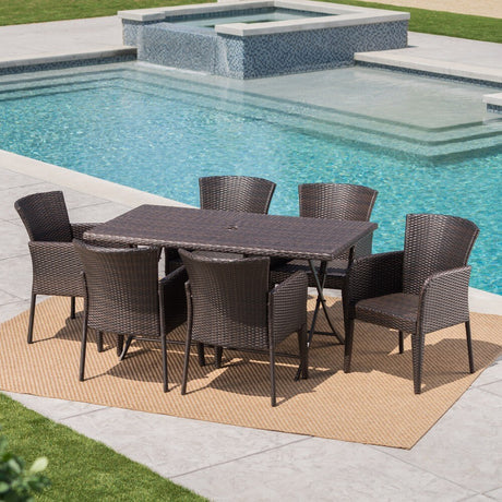 Kylon Outdoor 7-Piece Rectangle Foldable Wicker Dining Set with Umbrella Hole by Christopher Knight Home
