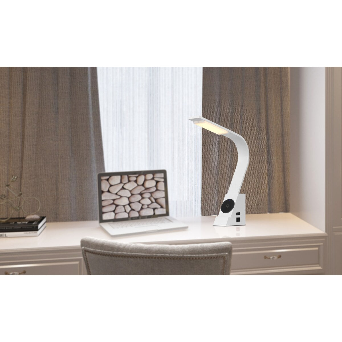 LED Convolution metal desk lamp with a wireless charging pad and 2 USB charging ports.