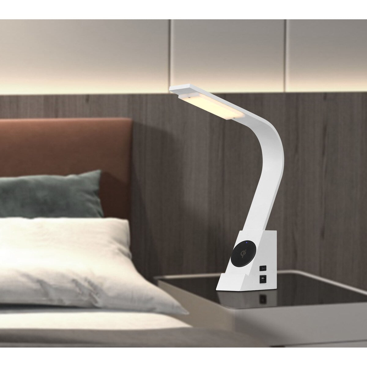 LED Convolution metal desk lamp with a wireless charging pad and 2 USB charging ports.