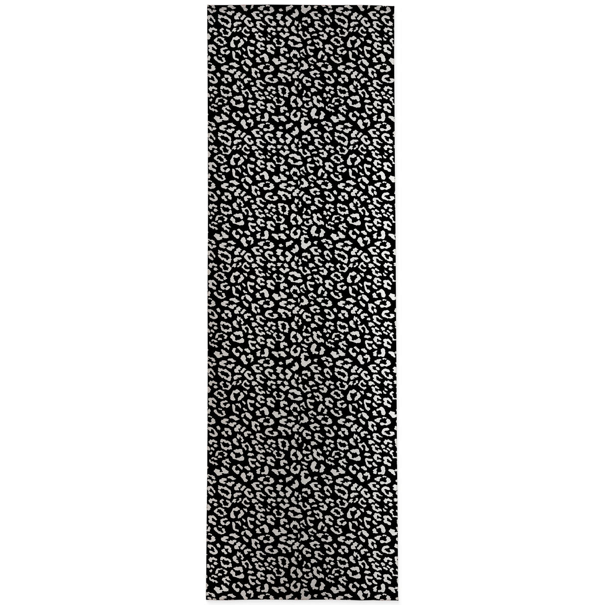 LEOPARD WHITE ON BLACK Area Rug by Marina Gutierrez