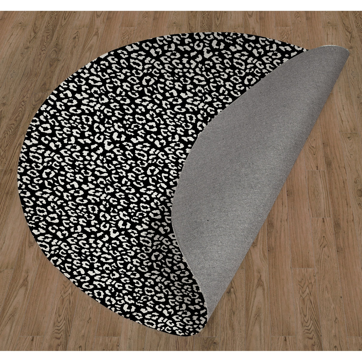 LEOPARD WHITE ON BLACK Area Rug by Marina Gutierrez