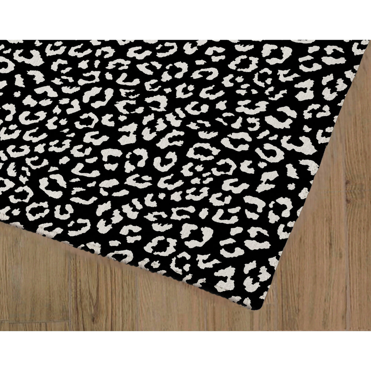 LEOPARD WHITE ON BLACK Area Rug by Marina Gutierrez