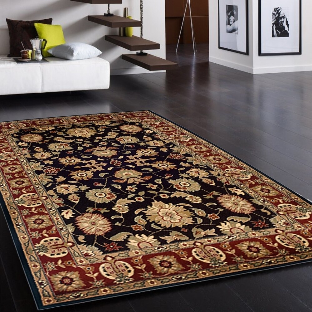 Sevita Black/ Red Olefin Area Rug - 5'1" x 7'5"/Surplus