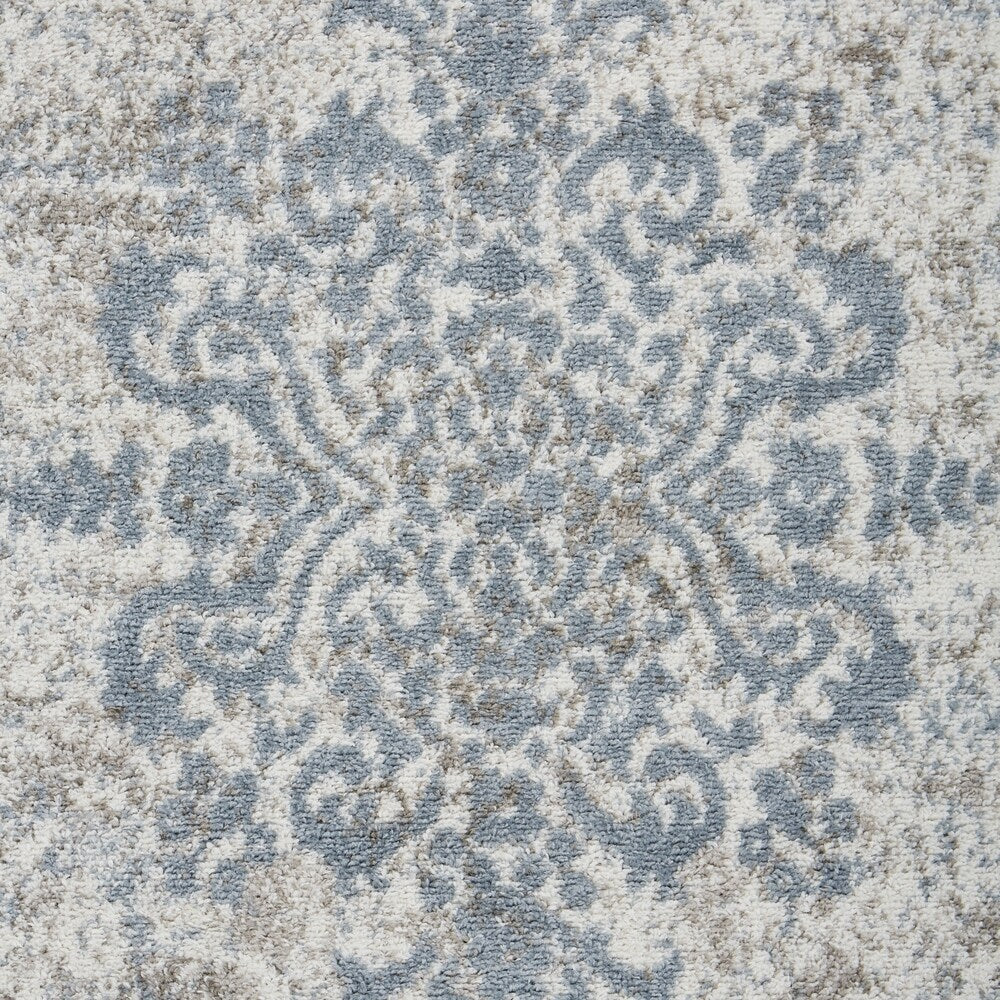 Sevita Gardenia / Blue Area Rug ( 5'2" x 7'2" ) - 5'2" x 7'2"