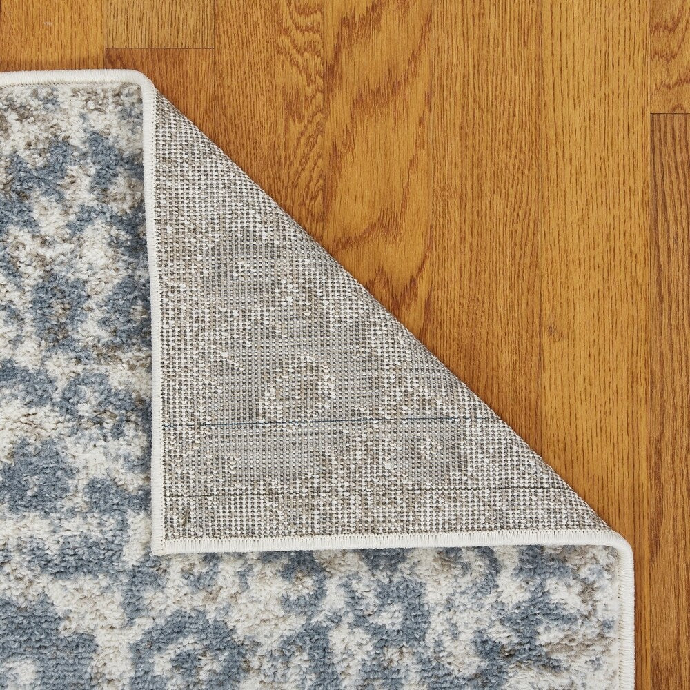 Sevita Gardenia / Blue Area Rug ( 5'2" x 7'2" ) - 5'2" x 7'2"