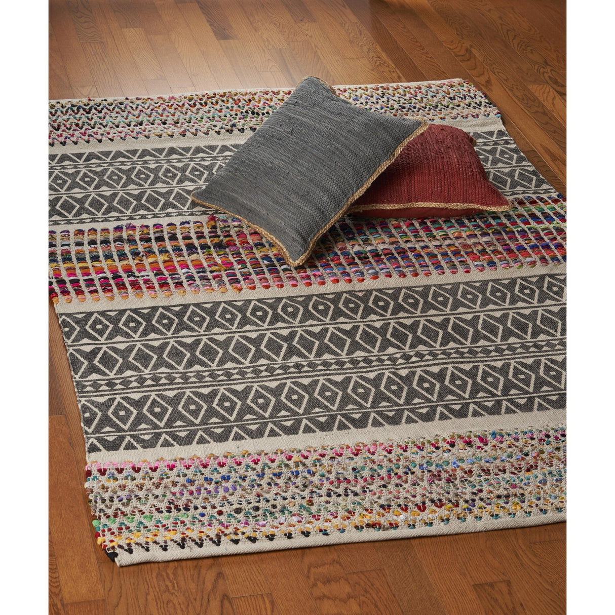 Sevita Geometric Chindi Area Rug
