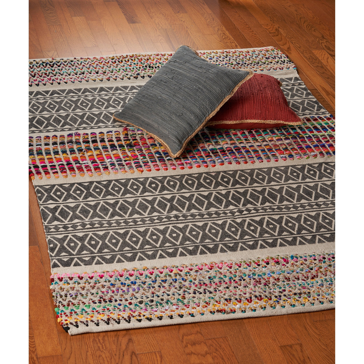 Sevita Geometric Chindi Area Rug