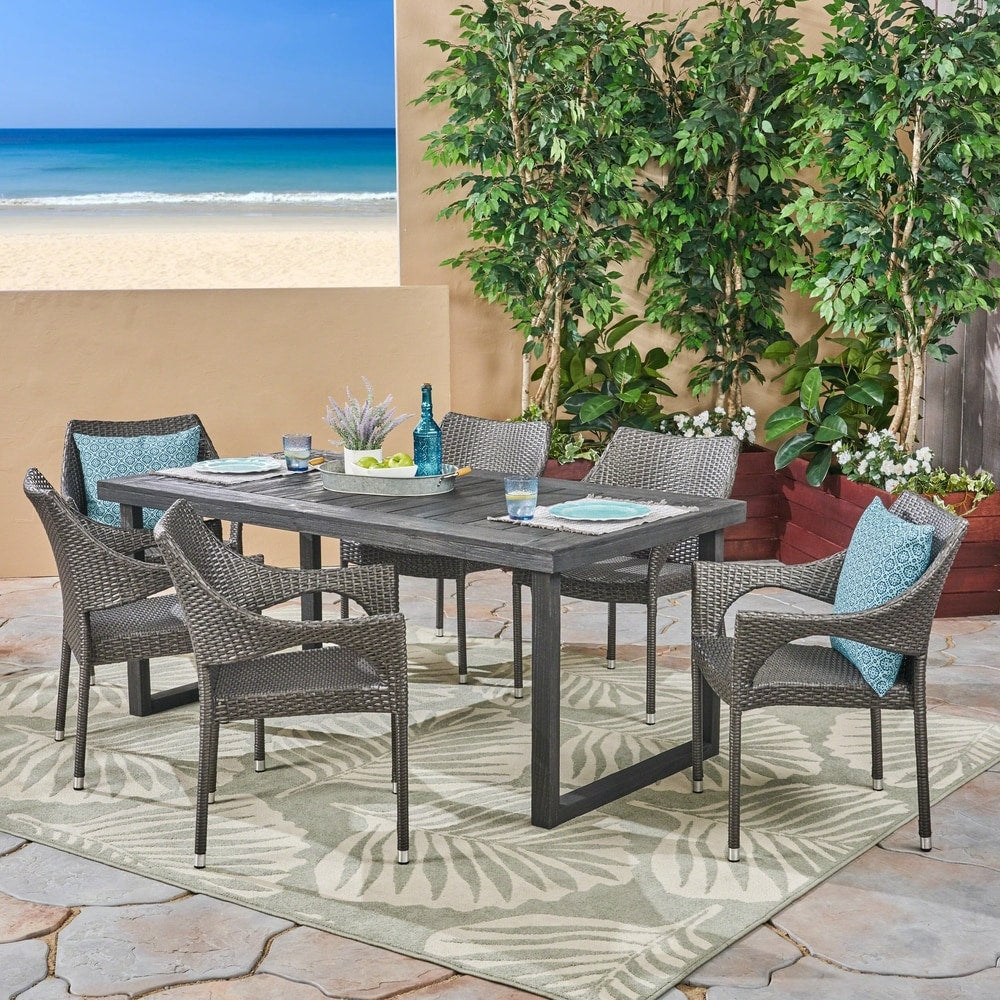 Lecanto Outdoor 7 Piece Acacia Wood Dining Set with Stacking Wicker Chairs by Christopher Knight Home