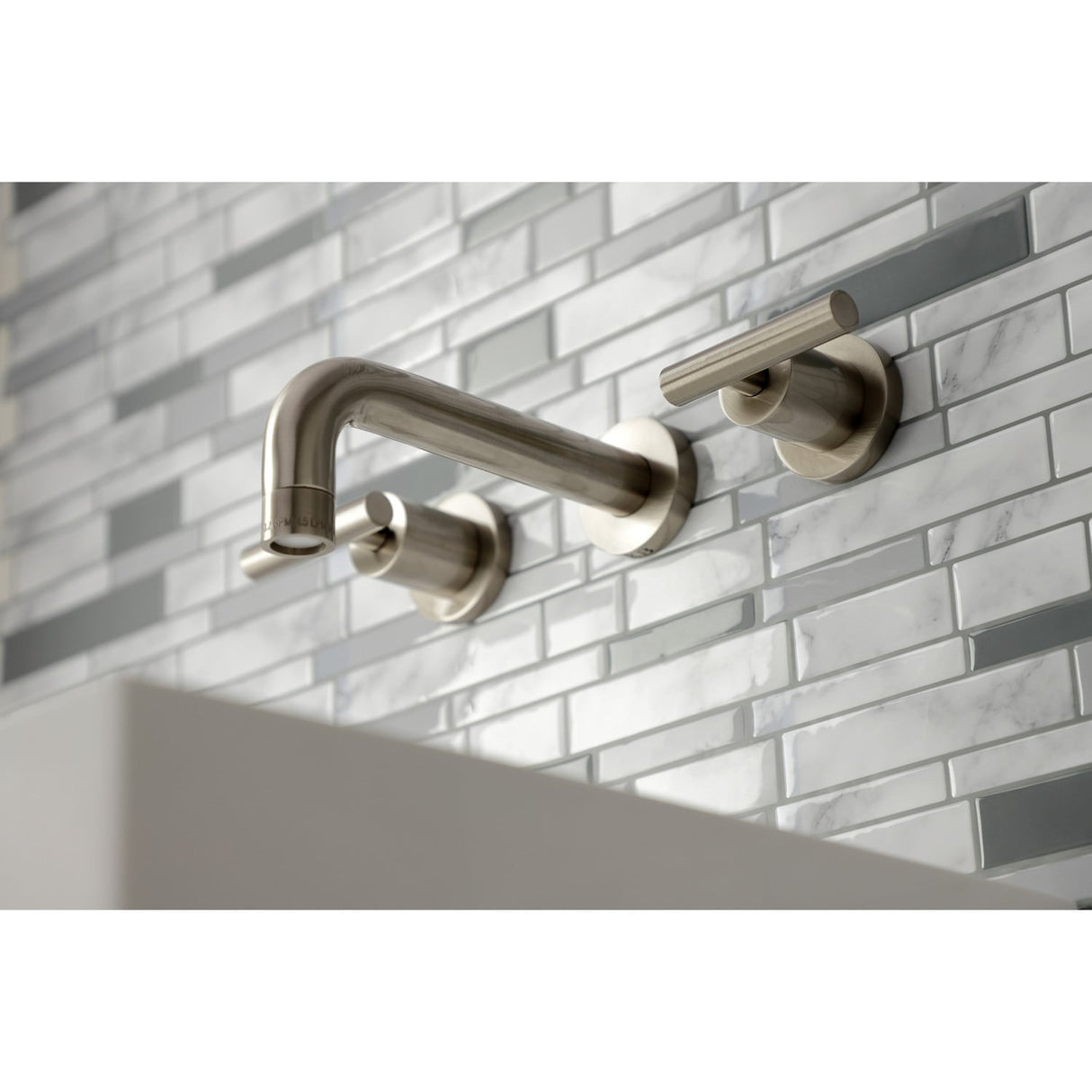 Kingston Brass Manhattan Two-Handle 3-Hole Wall Mount Bathroom Faucet