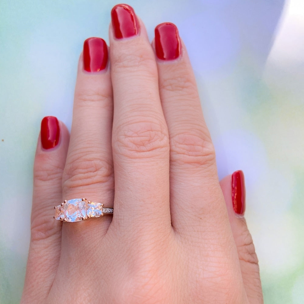 Miadora 10k Rose Gold Created White Sapphire and Diamond Accent 3-Stone Engagement Ring
