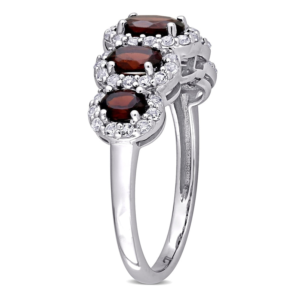 Miadora 10k White Gold Oval-cut Garnet and White Topaz 5-Stone Halo Ring
