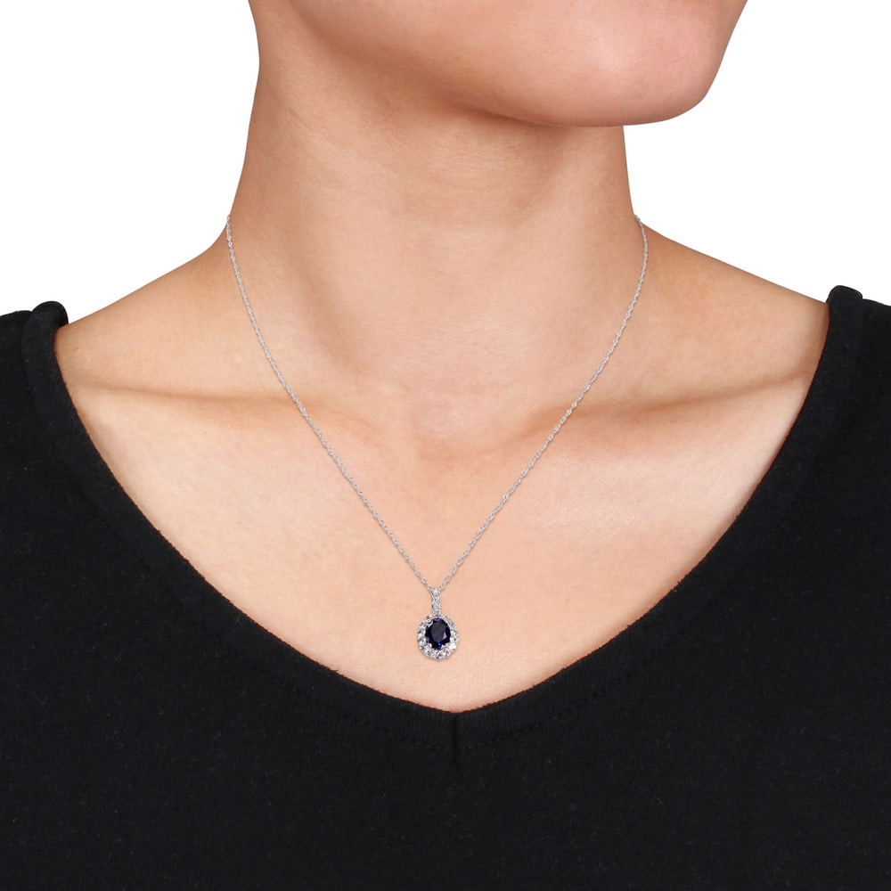 Miadora 14k White Gold Oval-cut Created Blue Sapphire White Topaz and Diamond Accent Halo Necklace