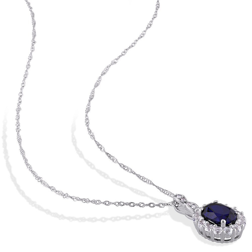 Miadora 14k White Gold Oval-cut Created Blue Sapphire White Topaz and Diamond Accent Halo Necklace