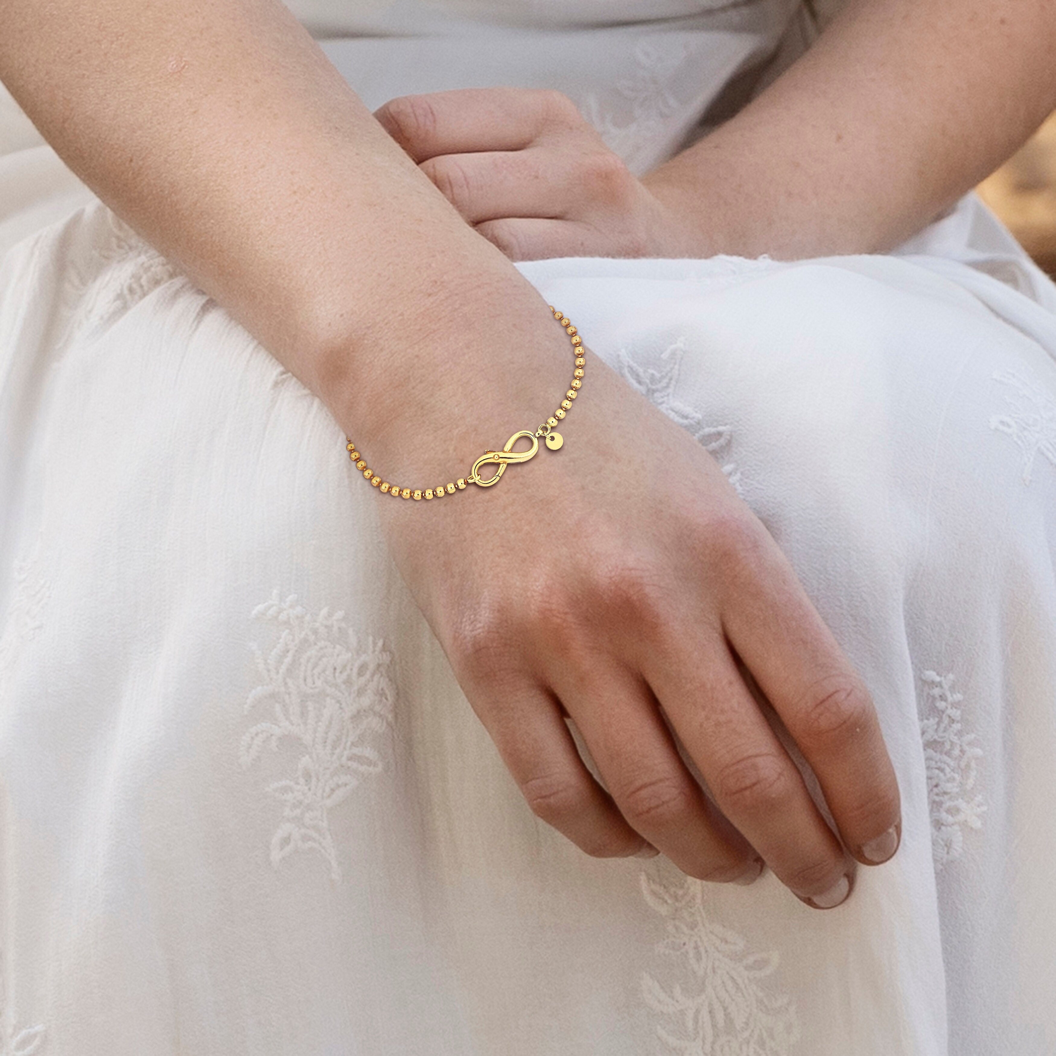 Miadora Ball link Bracelet with Infinity Clasp in Yellow Sterling Silver