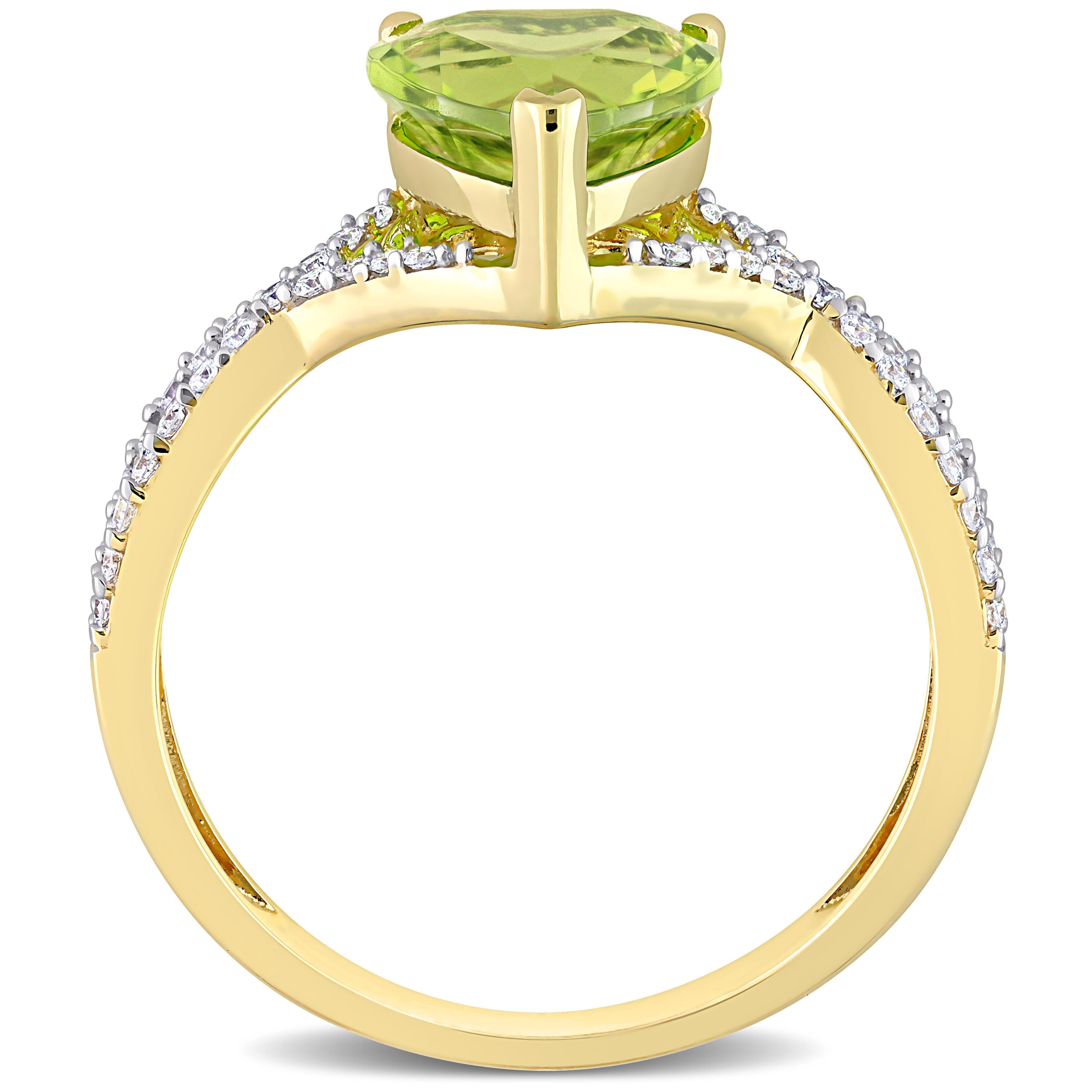 Miadora Heart-cut Peridot and 1/5ct TDW Diamond Crossover Ring in 14k Yellow Gold