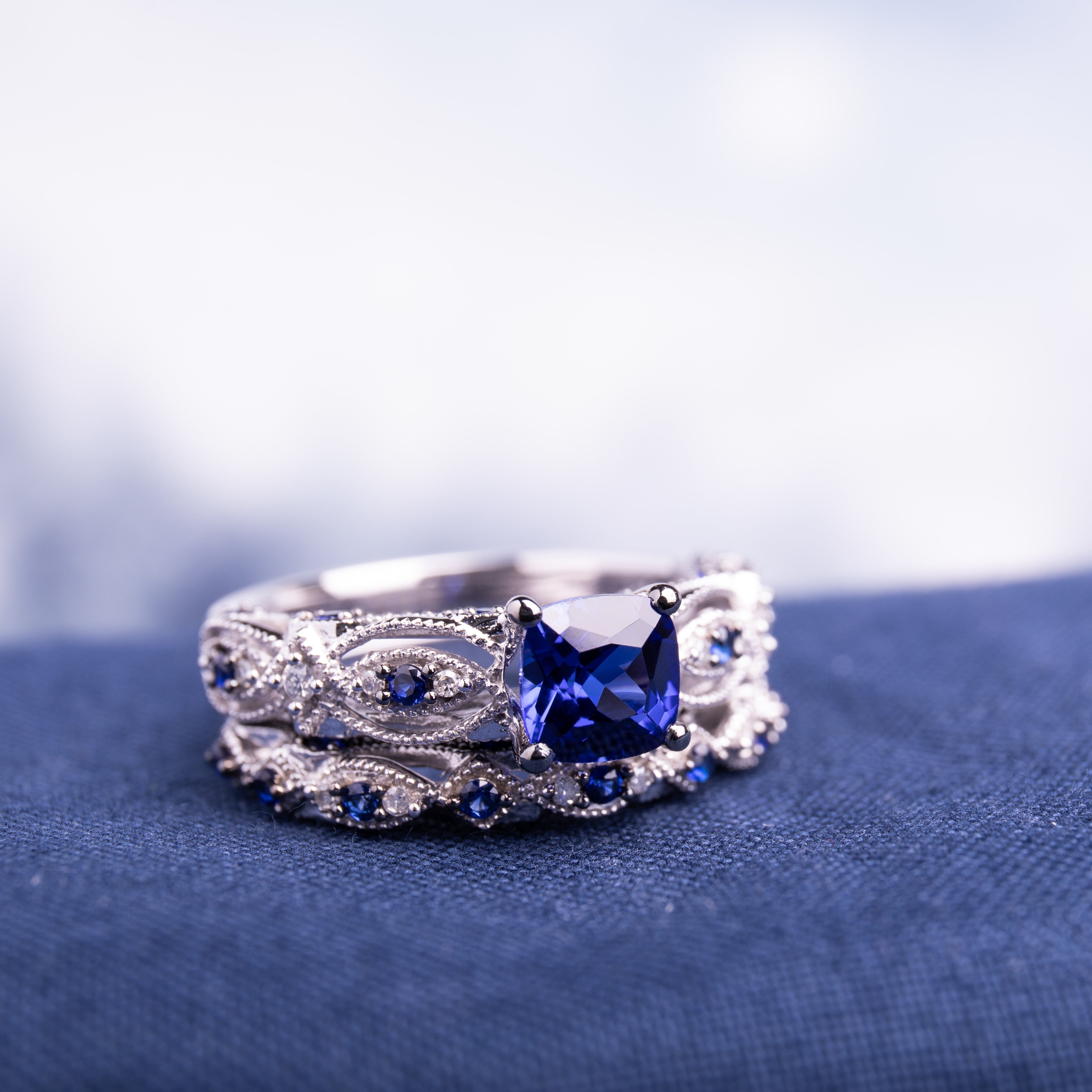 Miadora Signature Collection 10k White Gold Created Sapphire and 1/10ct TDW Diamond Bridal Set