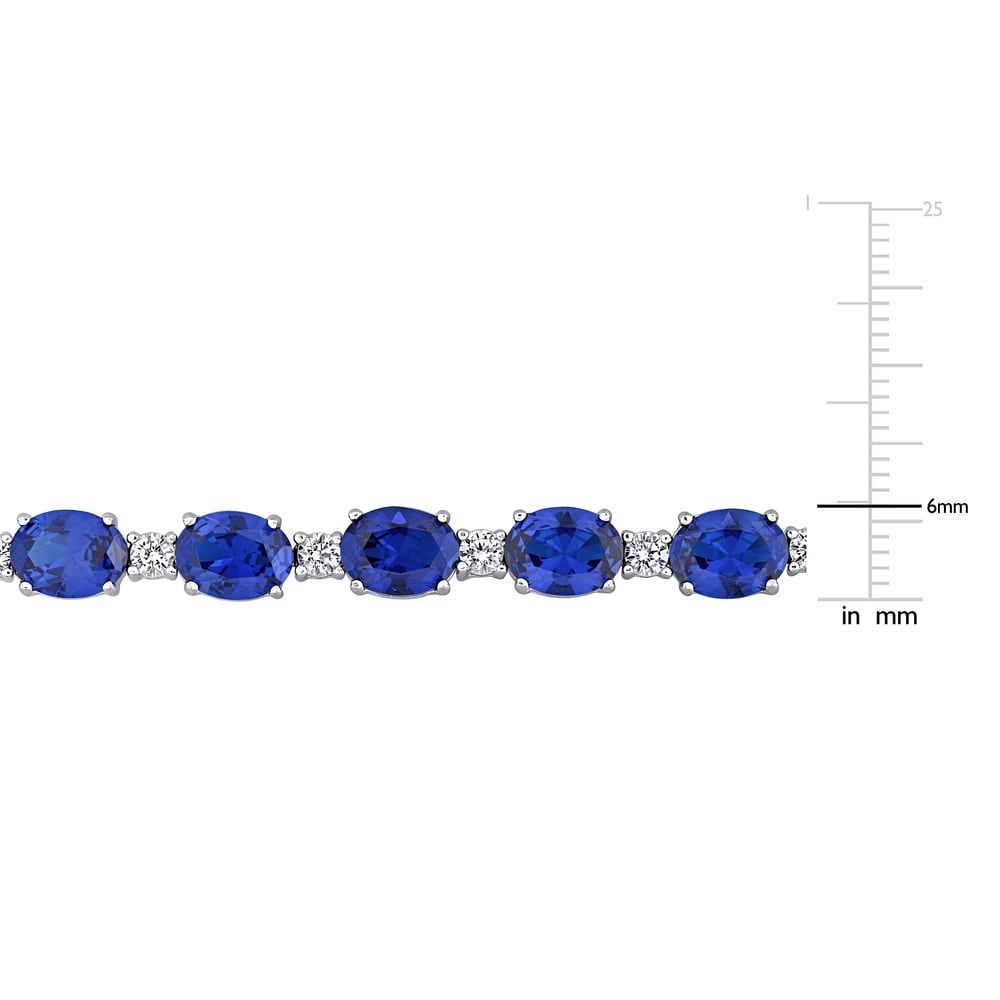 Miadora Sterling Silver Created Blue and White Sapphire Oval Link Tennis Bracelet
