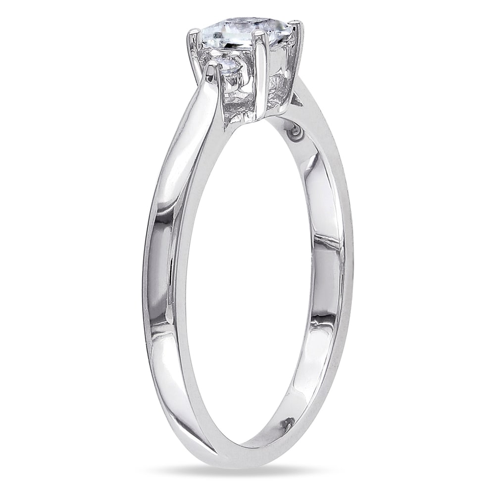 Miadora Sterling Silver Created White Sapphire and Diamond Accent Promise Ring