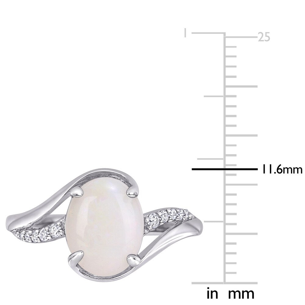 Miadora Sterling Silver Oval-Cut Opal and 1/10ct TDW Diamond Bypass Ring