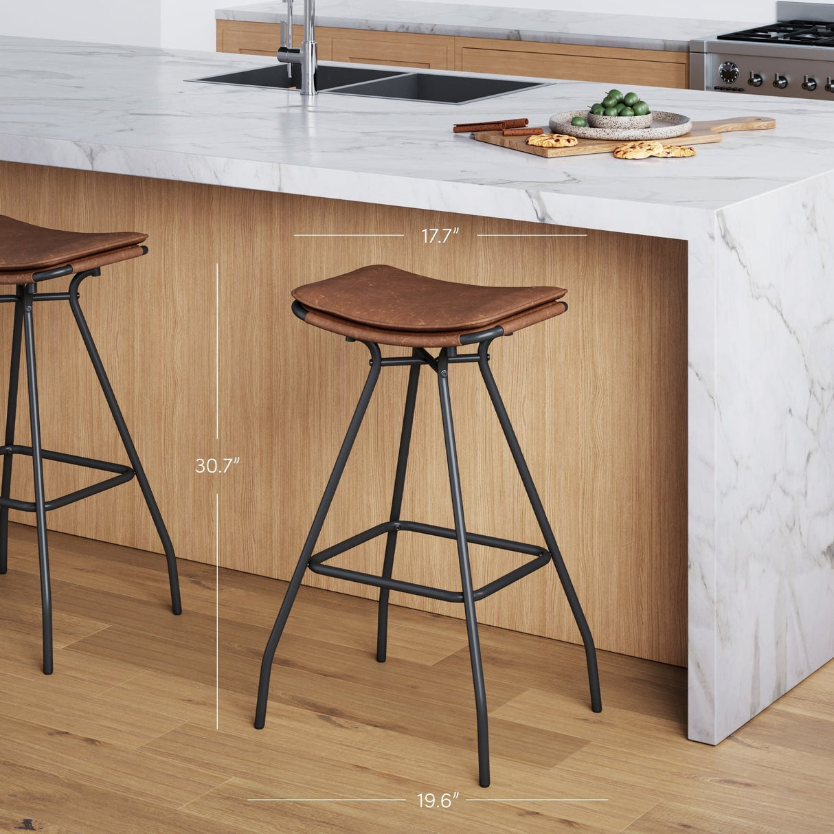 Nathan James Dominique Industrial Backless Kitchen Bar Stool with Brown Leather Saddle Seat and Metal Base